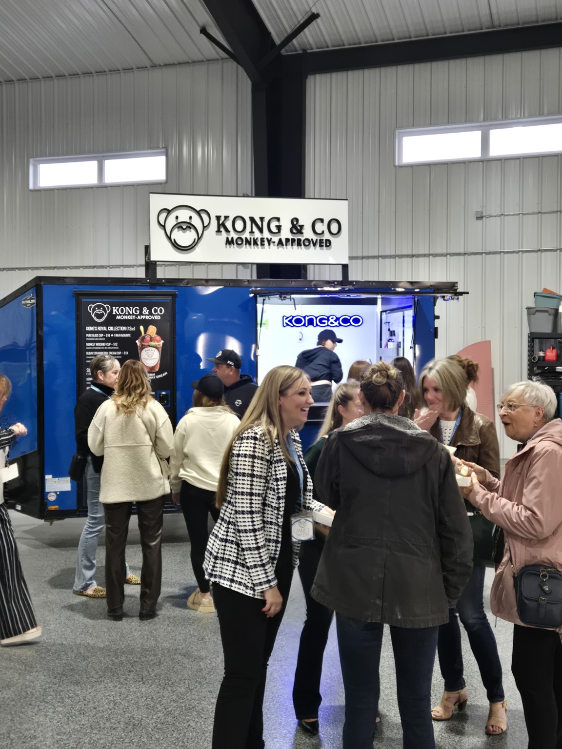 Kong&Co blue trailer with Monkey-Approved signage serving guests at an event